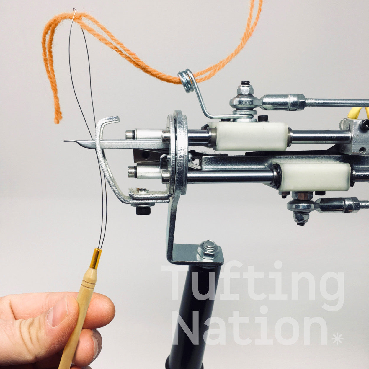 Yarn tool threading a tufting gun  | TuftingNation Canada 