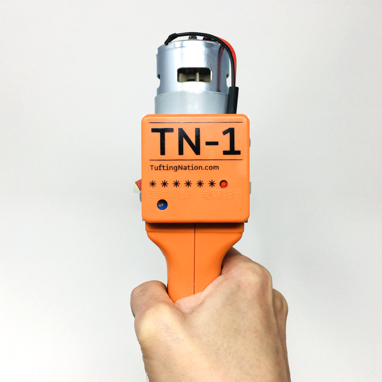 Orange TN-1 Rug Tufting Gun sold by TuftingNation Canada