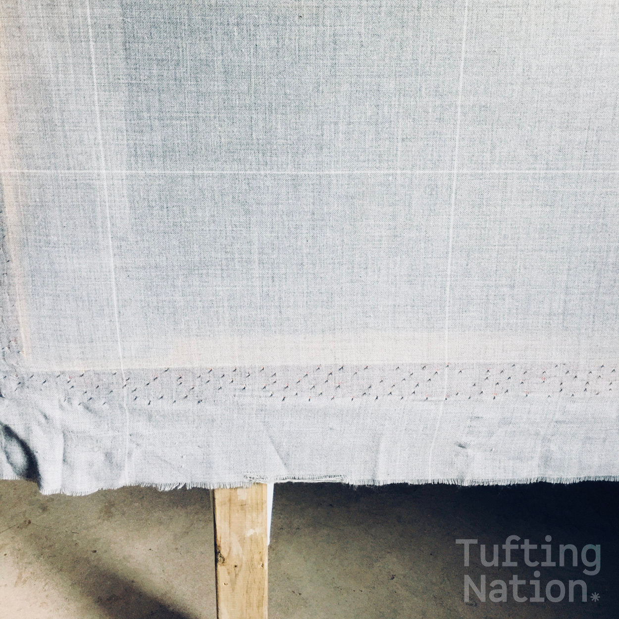 Gray Tufting Cloth on a Tufting Frame | TuftingNation