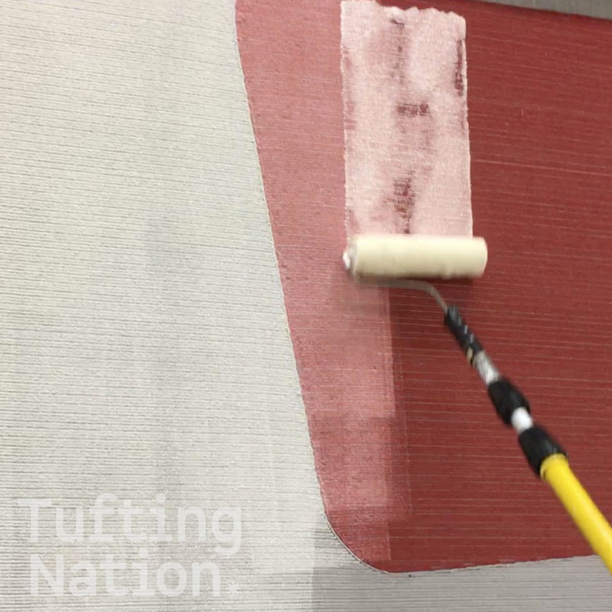 Liquid Rug Glue applied with roller to the back of tuft rug | TuftingNation