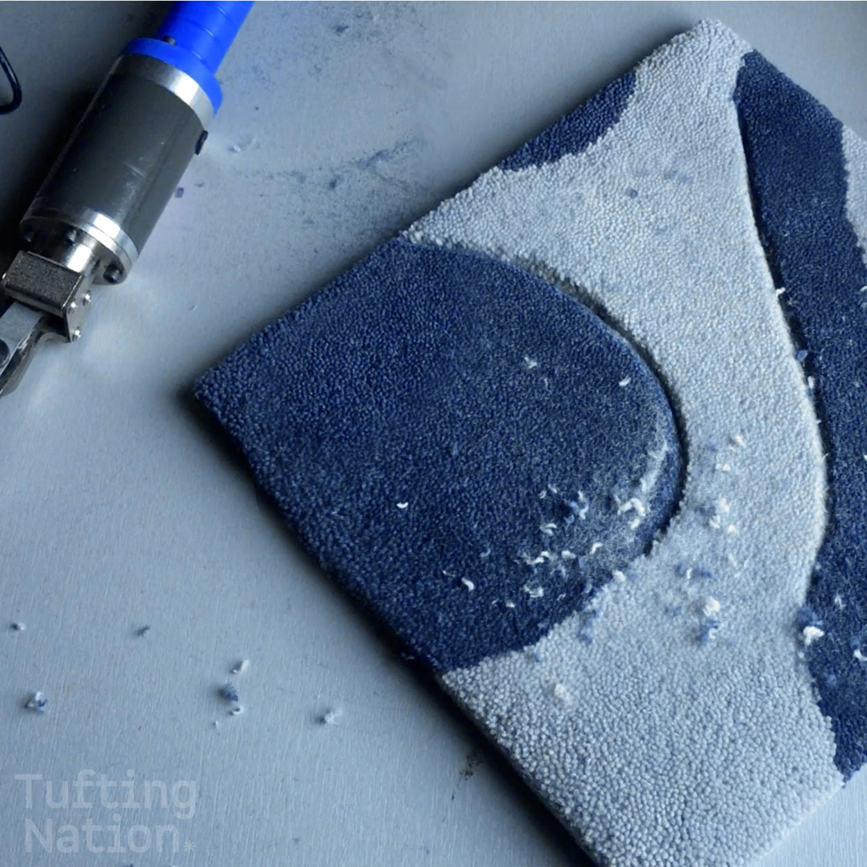 Tufted Rug Sculpted with an electric carving scissors | TuftingNation