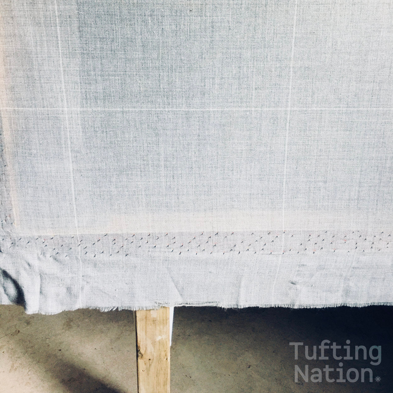 Gray Tufting Cloth on a Tufting Frame | TuftingNation