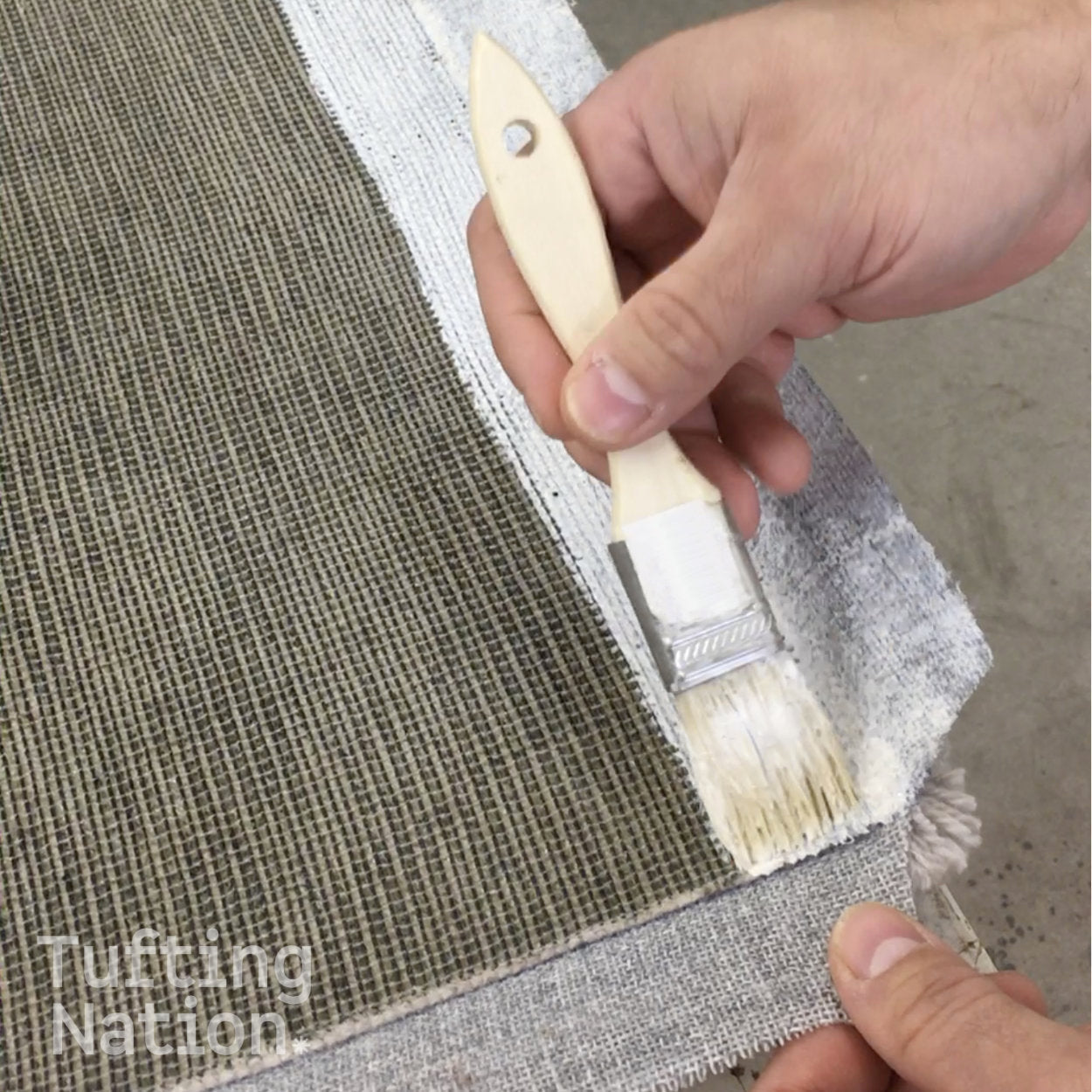 Adhesive glue for fabric borders on back of tufted rugs